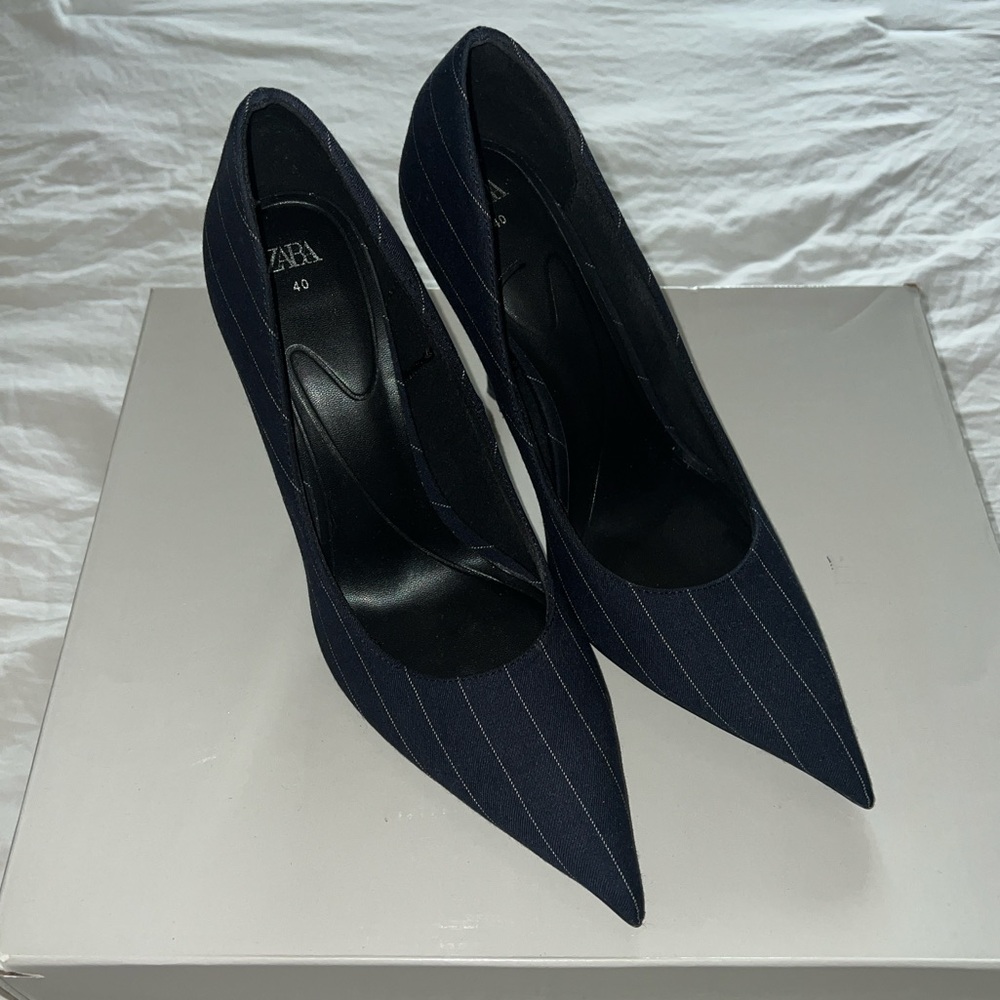 Navy pinstripe pumps